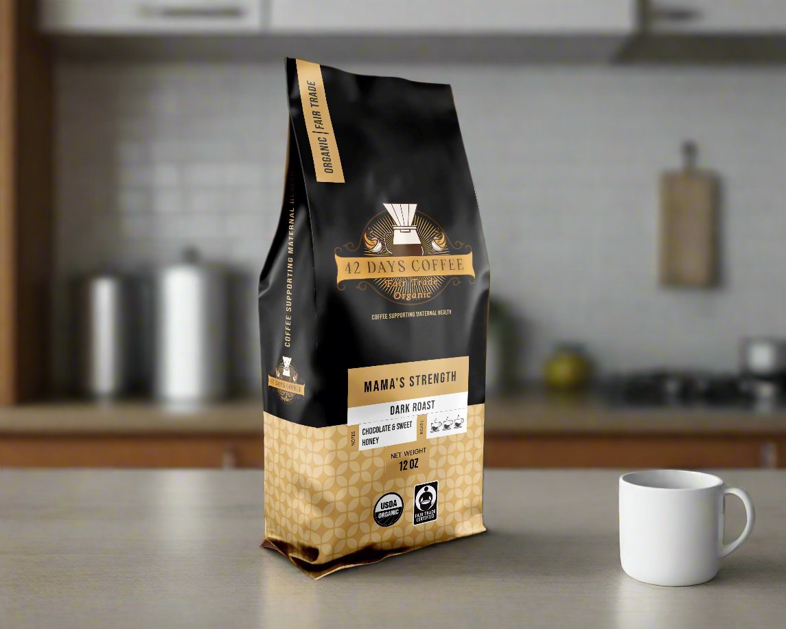 Mama's Strength coffee bag sitting on a counter. Dark roast variety