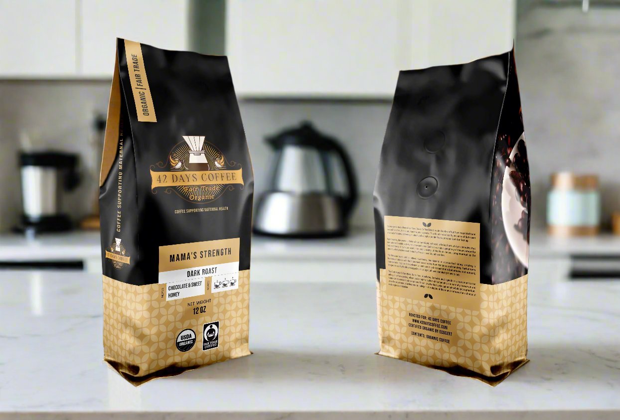 Mama's Strength coffee bags sitting on a counter. Front and back view.